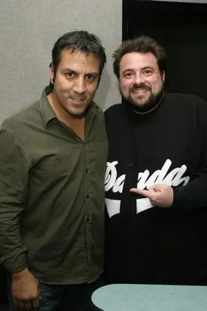 Leo Quinones with Kevin Smith — Director — Clerks, Dogma