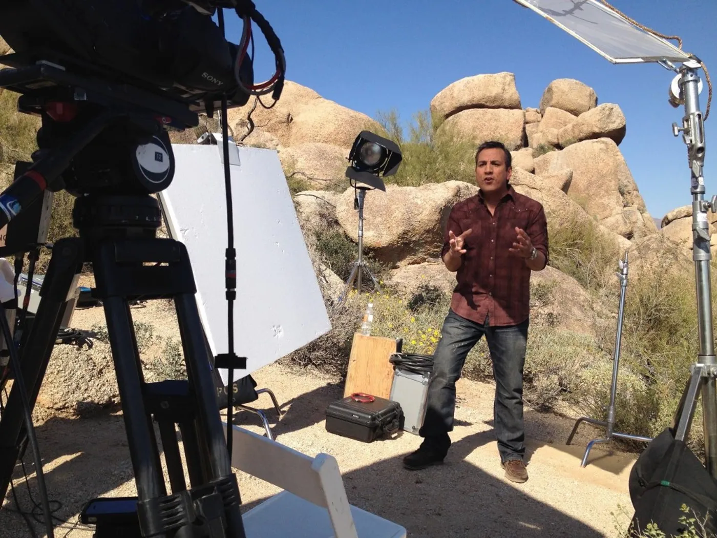 Leo Quinones on a professional television film set — host and creator of Film Freak Tours Hollywood